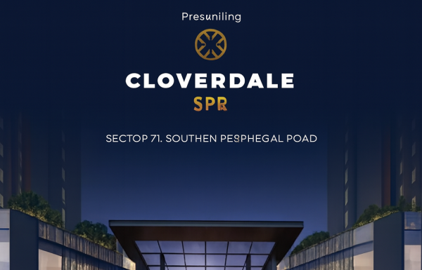 Night view of Cloverdale SPR by Signature Global showcasing a grand luxury clubhouse with modern architecture and illuminated facade.