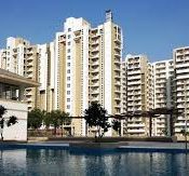 Residential apartment towers in Park View City 2, Gurugram featuring modern high-rise buildings, landscaped surroundings, swimming pool, and a premium gated community.