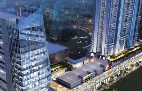 Night view of M3M Sky Walk in Sector 73, Gurugram showcasing modern high-rise towers, integrated retail spaces, illuminated façades, and premium urban surroundings.