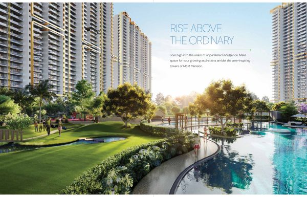 A high-end architectural visualization of M3M Mansion featuring towering residential skyscrapers overlooking a lush, landscaped garden. The scene includes a winding waterfront path, manicured green lawns, and mature trees under a bright sky with the tagline "Rise Above The Ordinary.